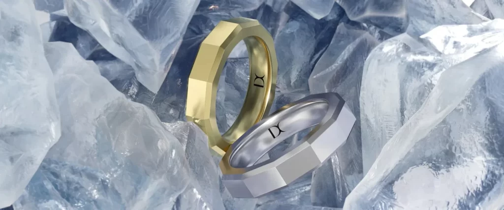 The current image has no alternative text. The file name is: Gold_wedding_bands_in_yellow_and_white_gold_on_ice._0d3b3fa5-e36b-4aa3-97e9-dd12ec950ade-273697-1.webp